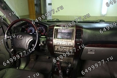 Тюнинг приборной панели Lexus GX470: темное дерево, серая кожа Тюнинг панели автомобиля Lexus GX470: темное дерево, серая кожа